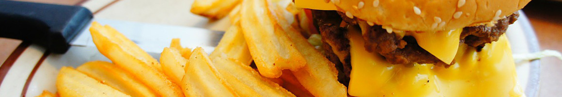 Eating Burger at Eureka Stars Hamburgers restaurant in Eureka, CA.